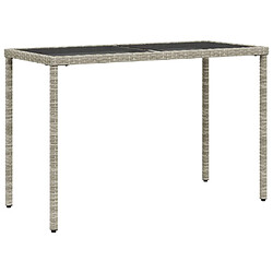 vidaXL Table de jardin dessus en verre gris clair 115x54x74 cm rotin