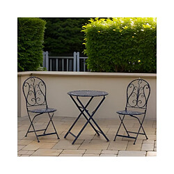 Aubry Gaspard Table et chaises de jardin en métal laqué rouge bleu antique.