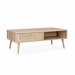 Table basse en cannage 110x59x39cm - Naturel | sweeek Table basse en cannage 110 x 59 x 39 cm - Bohème - Naturel. 1 tiroir. 1 espace de rangement. pieds scandinaves