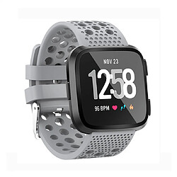 Wewoo Bracelet pour montre connectée Smartwatch avec perforé à cercle trou de ventilation Fitbit Versa Gris 