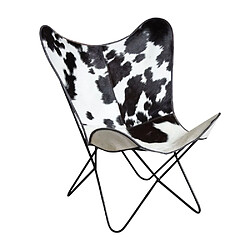 Aubry Gaspard Fauteuil butterfly en peau de vache noir.