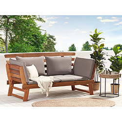 Beliani Banc de jardin PORTICI avec coussin Bois 210 cm Marron clair