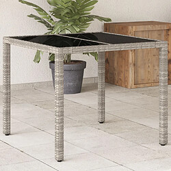 vidaXL Table de jardin avec dessus en verre gris clair résine tressée