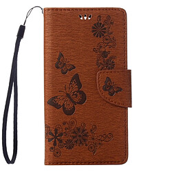 Wewoo Coque marron Wiko U Feel Lite Étui en cuir à rabat avec motif fleurs et papillon avec boucle magnétique Titulaire & Slots de cartes Portefeuille