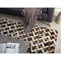 Avis Beliani Tapis en cuir gris et marron 140 x 200 cm TUGLU