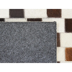 Beliani Tapis patchwork en cuir beige et marron 140 x 200 cm KAYABEY pas cher