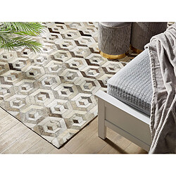 Avis Beliani Tapis patchwork en cuir beige et marron 140 x 200 cm TAVAK