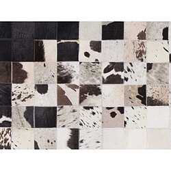 Beliani Tapis en cuir noir et blanc 140 x 200 cm KEMAH pas cher