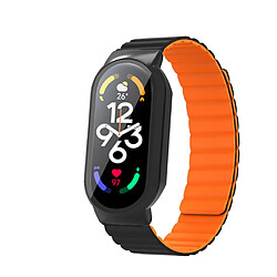 Bracelet en silicone magnétique pour votre Xiaomi Mi Band 7/7 NFC - noir/orange