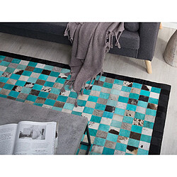 Avis Beliani Tapis en cuir bleu turquoise et gris 140 x 200 cm NIKFER