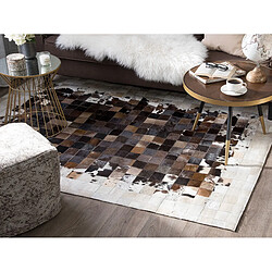 Avis Beliani Tapis en cuir 140 x 200 marron/beige OKCULU