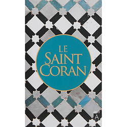 Le saint Coran : et la traduction du sens de ses versets en claire langue française