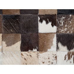 Beliani Tapis en cuir 140 x 200 marron/beige OKCULU pas cher