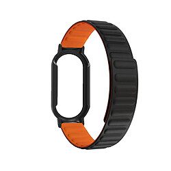 Bracelet en silicone magnétique pour votre Xiaomi Mi Band 7/7 NFC - noir/orange