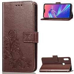 Wewoo Housse Coque Étui en cuir à Motif fleurs pressées Lucky Clover pour ASUS ZB633KLavec support & emplacements de cartes & Portefeuille et dragonne Marron