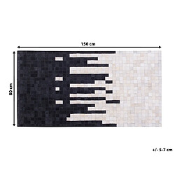 Beliani Tapis noir et crème en peau de vache 80 x 150 cm BOLU