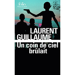 Un coin de ciel brûlait : thriller - Occasion