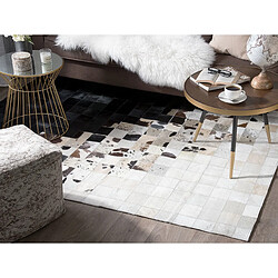 Avis Beliani Tapis en cuir noir et blanc 140 x 200 cm KEMAH