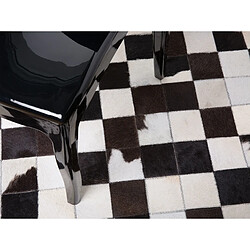 Avis Beliani Tapis rond patchwork en cuir noir et blanc BERGAMA