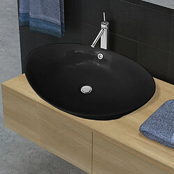 vidaXL Lavabo ovale en céramique noir avec trop plein 59 x 38,5 cm