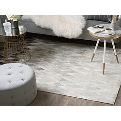 Avis Beliani Tapis en cuir blanc et gris 140 x 200 cm MALDAN