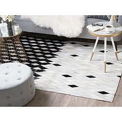 Avis Beliani Tapis en cuir blanc et noir 140 x 200 cm MALDAN