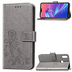 Wewoo Housse Coque Étui en cuir à Motif fleurs pressées Lucky Clover pour ASUS ZB633KLavec support & emplacements de cartesporte-monnaie et dragonne Gris