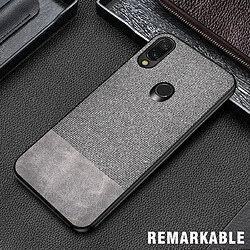 Wewoo Coque Rigide Housse de protection en tissu PU épissage antichoc pour Xiaomi Redmi 7 Gris