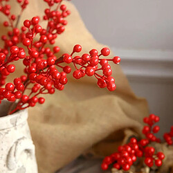 Baies rouges artificielles avec tige de houx