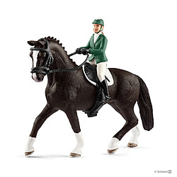 Schleich Cavalière de saut d'obstacles avec cheval - 42358 Cavalière de saut d'obstacles avec cheval.