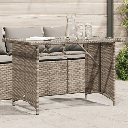 vidaXL Table de jardin avec dessus en verre gris 110x68x70 cm rotin