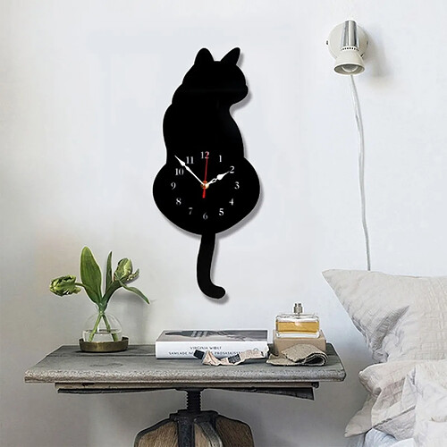 Wewoo Horloge murale noir 42 * 18cm bureau à domicile décoration de la chambre à coucher en forme de chat en de avec des queues pivotantes