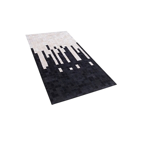 Beliani Tapis noir et crème en peau de vache 80 x 150 cm BOLU