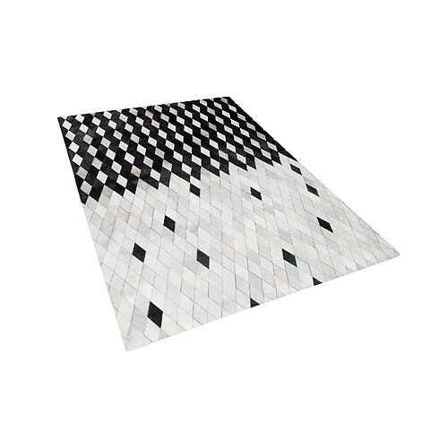 Beliani Tapis en cuir blanc et noir 140 x 200 cm MALDAN